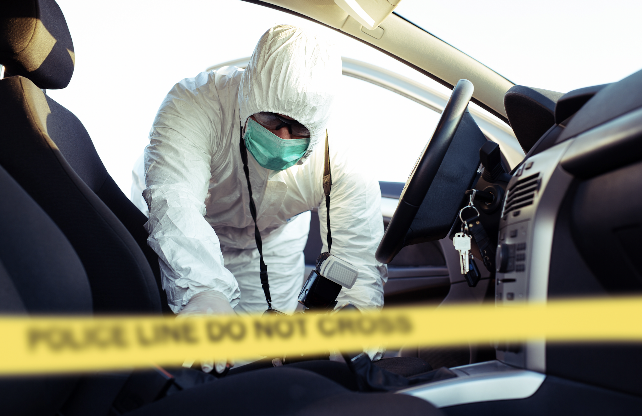 Image of a forensic scientist at a crime scene