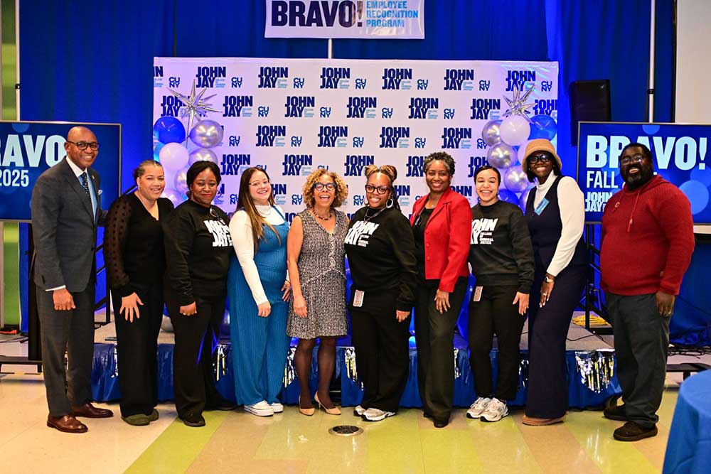 President Mason posing with award recipients at BRAVO 2025 event
