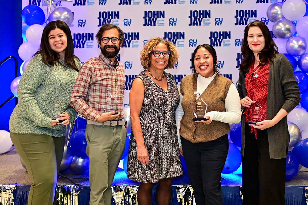 President Mason posing with award recipients at BRAVO 2025 event