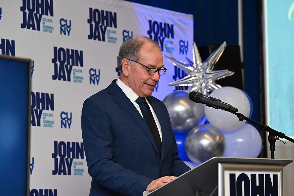 Mark Flower speaking at BRAVO 2025 event