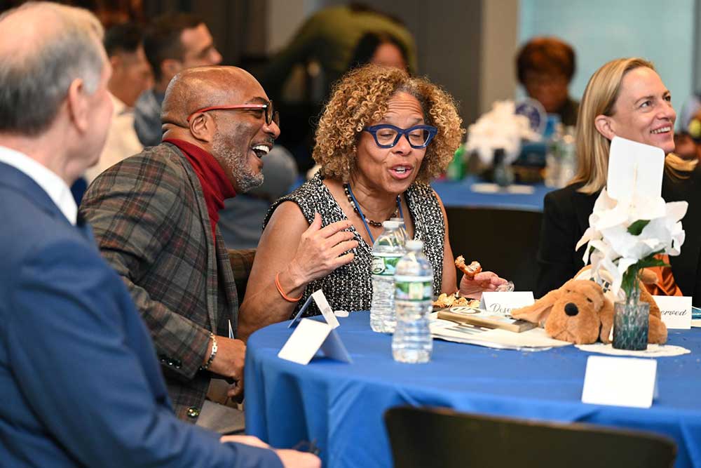 President Karol Mason and participants at BRAVO 2025 event