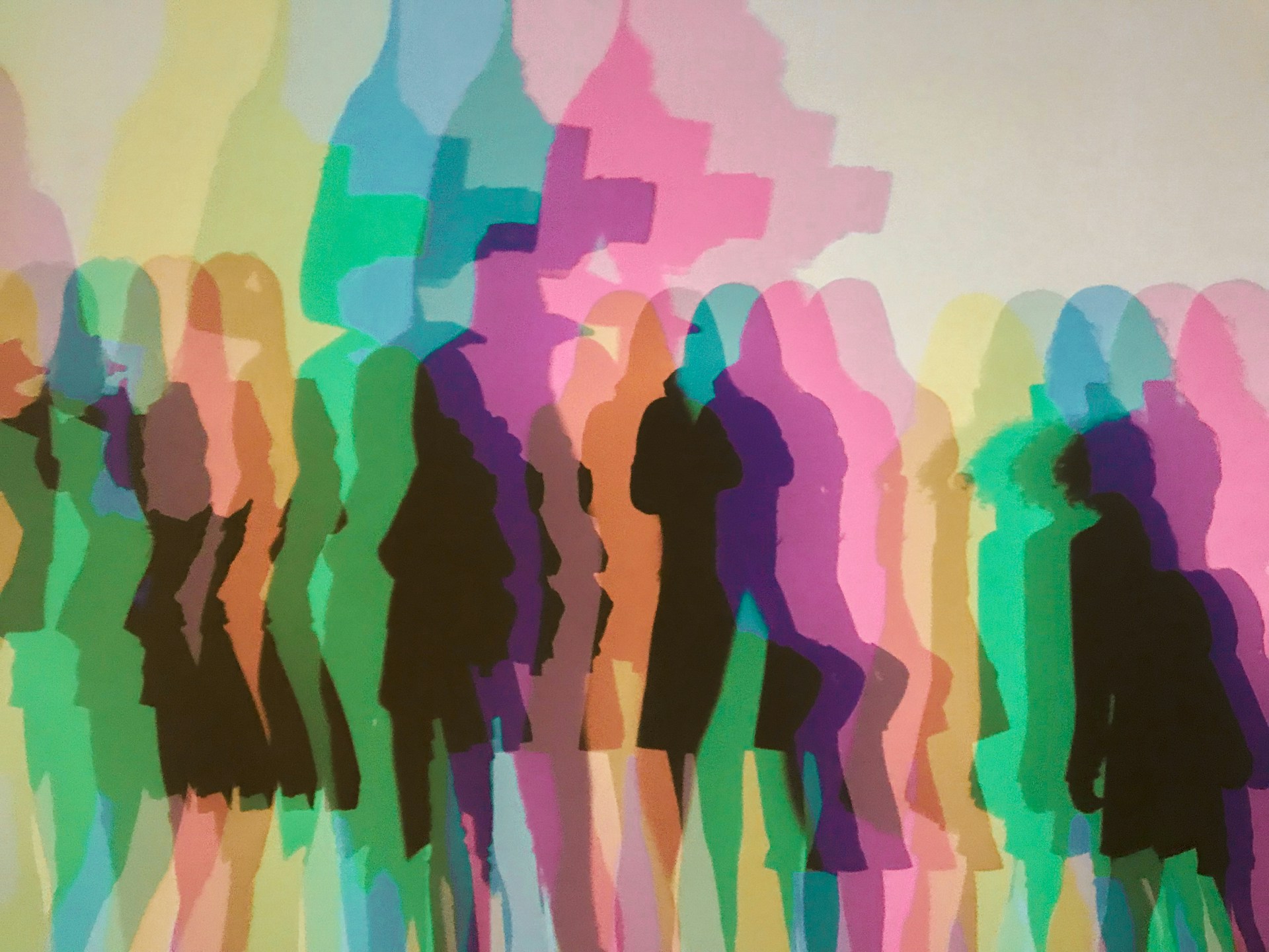 Abstract silhouettes of women in pastel colors