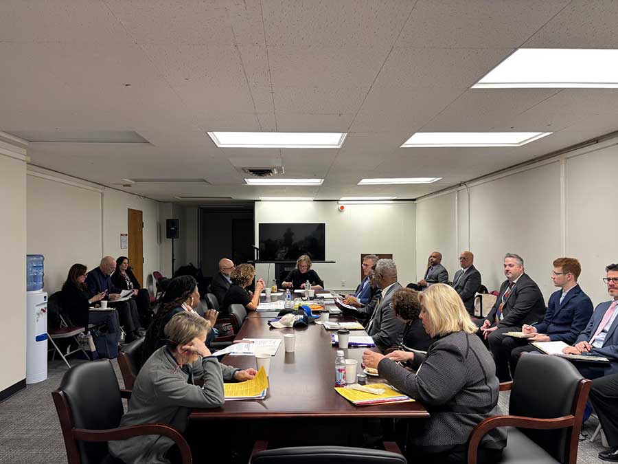 Legislators and CUNY Presidents sitting around a table