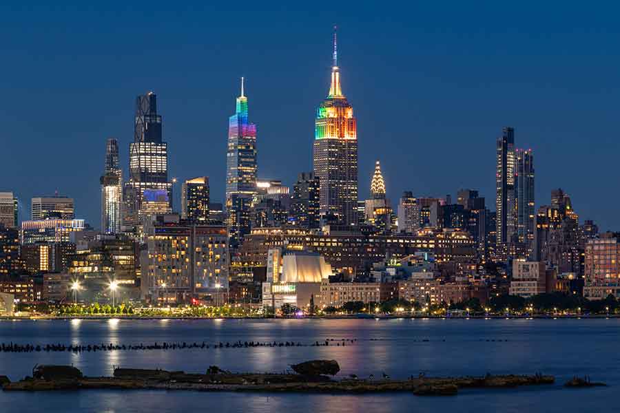 NYC skyscrapers illuminated with rainbow colors for Pride week