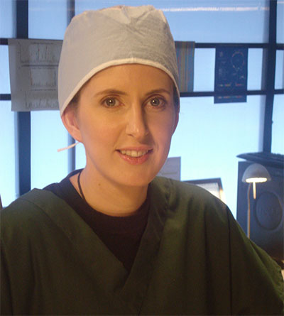 Portrait of Angelique Corthals in scrubs