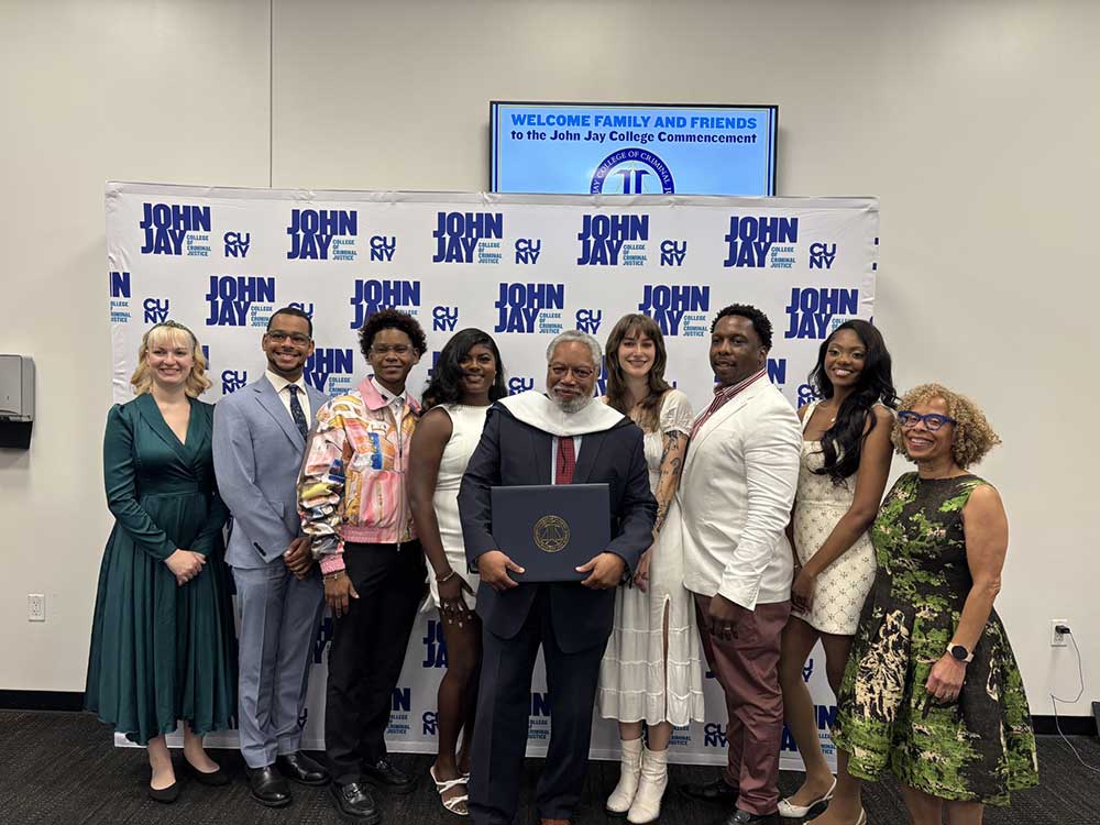 Dr. Bunch with John Jay college Graduates & President Mason