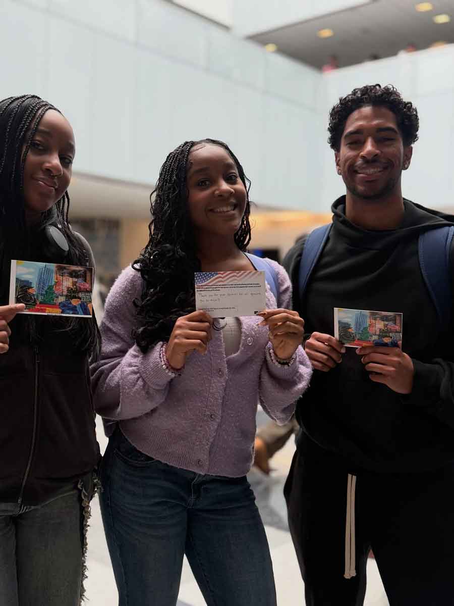 Students holding gratitude cards for 9/11