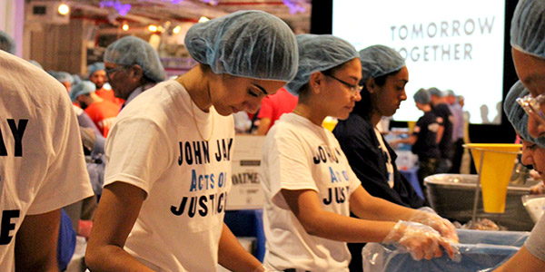 The John Jay community works together during the pack-a-thon