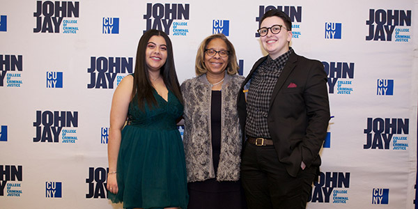 President Karol Mason posing with students at Champions of Justice 2019