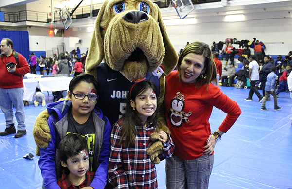 Family with John Jay BLoodhound at the Annual Children's Party