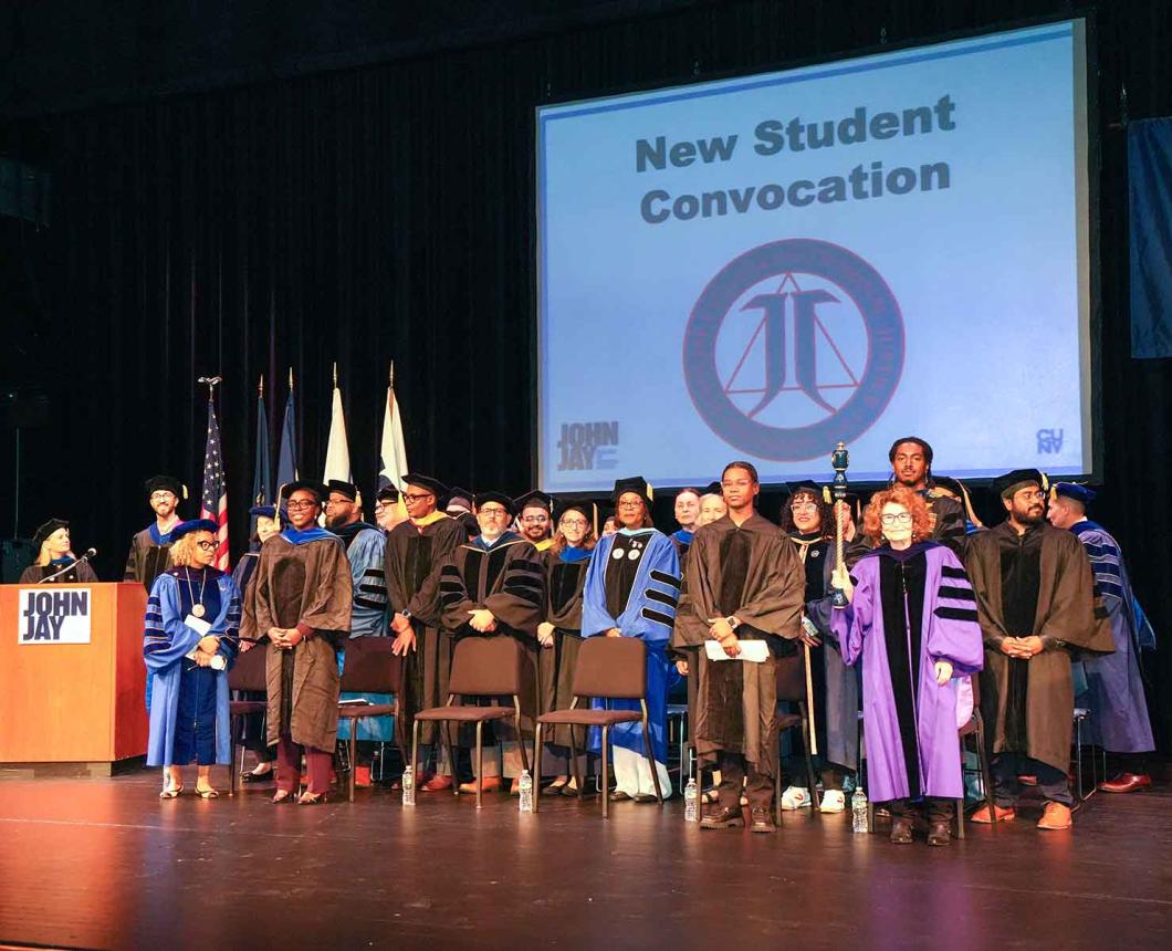 Faculty on stage at New Student Convocation