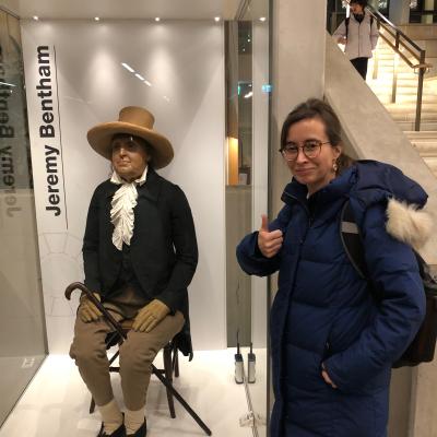 Jennifer Page standing in front of Jeremy Bentham's preserved body