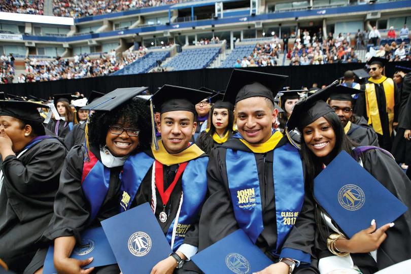 Four students at Commencement